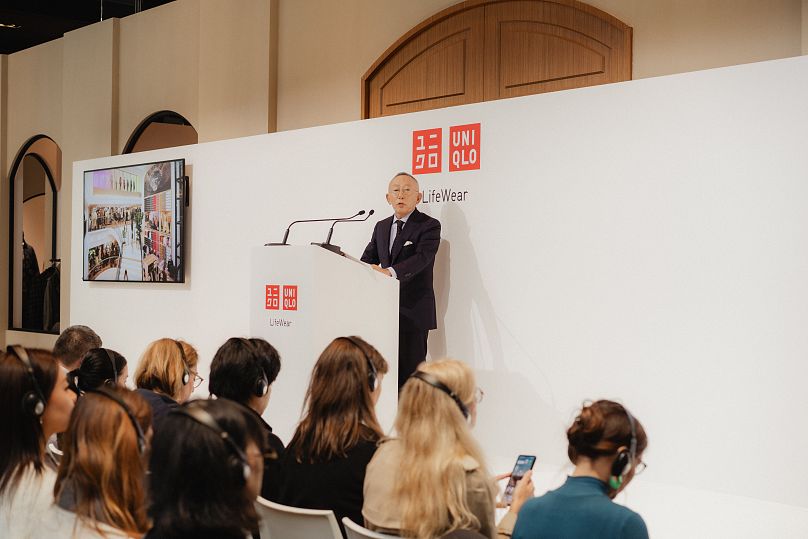 Uniqlo and Fast Retailing CEO Tadashi Yanai opens Paris exhibition.