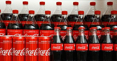 Coca-Cola loses its fizz with plan to axe hundreds of jobs in 
