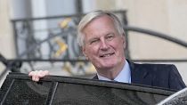 FILE: French Prime Minister Michel Barnier boards a car after the first weekly cabinet meeting at the Elysee Palace, 23 September 2024