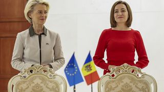  European Commission President Ursula von der Leyen, left, stands next to Moldova's President Maia Sandu, in Chisinau, Moldova, Thursday, Oct. 12, 2023. 