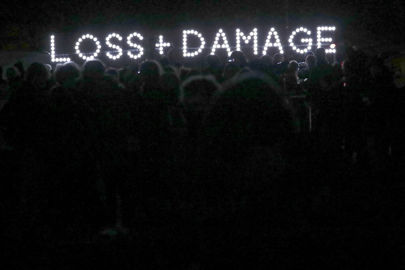  People start to leave at the end of a rally after a protest at COP26 in Glasgow, 2021. 