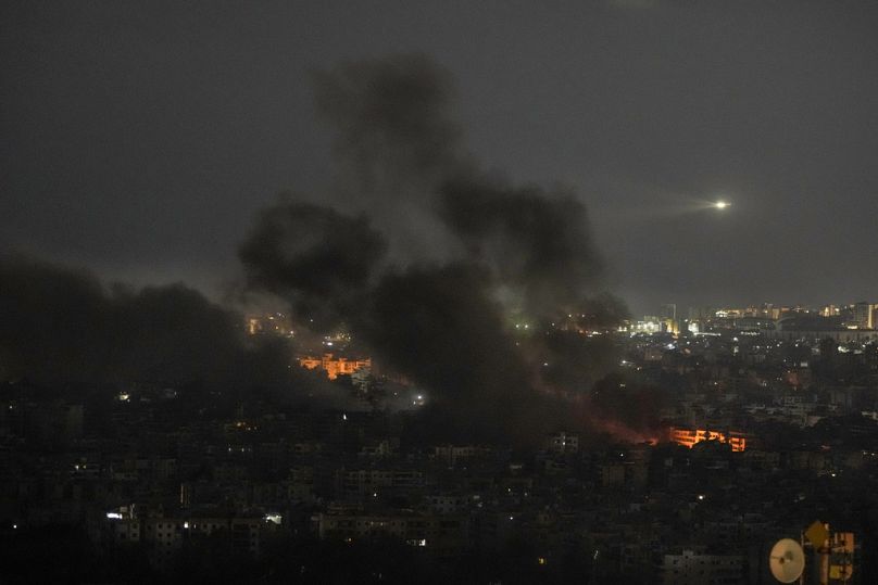 Smoke rises after Israeli airstrikes in Dahiyeh, Beirut, Lebanon, Saturday, Oct. 5, 2024. (AP Photo/Bilal Hussein