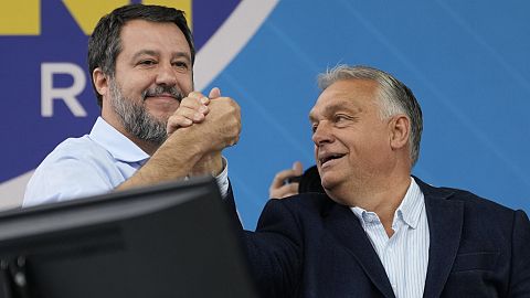 Italy's right-wing League party leader Matteo Salvini, left, with Hungarian Prime Minister Viktor Orban in Pontida, north of Milan, Italy, Sunday, Oct. 6, 2024. 