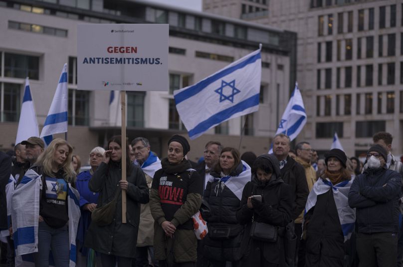 People attend a demonstration to protest against antisemitism and to show their support for Israel at the Brandenburg Gate in Berlin, Germany, Wednesday, Oct. 2, 2024.