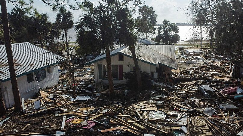 Debris surrounds the Faraway Inn Cottages and Motel in the aftermath of Hurricane Helene, in Cedar Key, Fla., Sept. 27, 2024. 