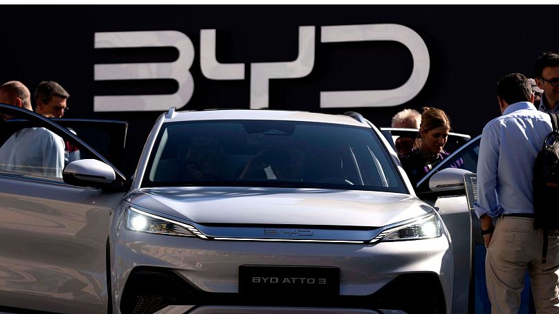 Visitors check the China made BYD ATTO 3 at the IAA motor show in Munich, Germany.