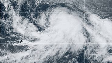 This satellite image provided by the National Oceanic and Atmospheric Administration, NOAA, shows Tropical Storm Kirk strengthening over the Atlantic Ocean. This satellite image provided by the National Oceanic and Atmospheric Administration, NOAA, shows Tropical Storm Kirk strengthening over the Atlantic Ocean.