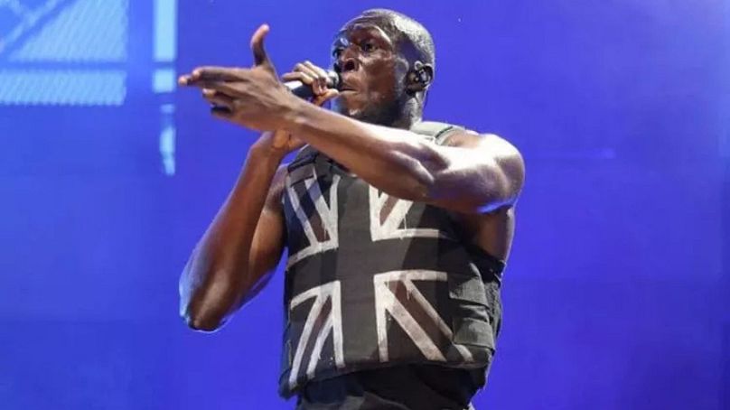 Stormzy wore one of the vests from the Banksy collection at Glastonbury