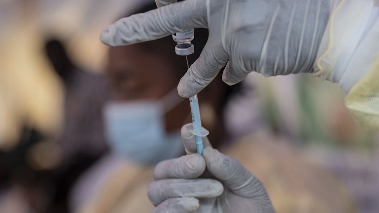 A nurse prepares to administer an mpox vaccine in the Democratic Republic of Congo in 2024. 