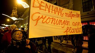 Residents of the northern Dutch province of Groningen demand action in 2018 over damage from earthquakes linked to decades of gas production