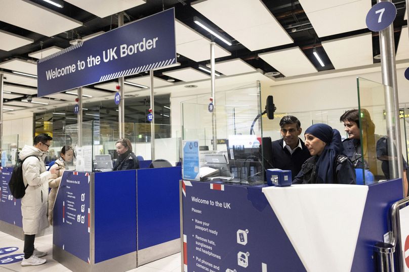 Former British Prime Minister Rishi Sunak meets Border Force staff at Gatwick Airport