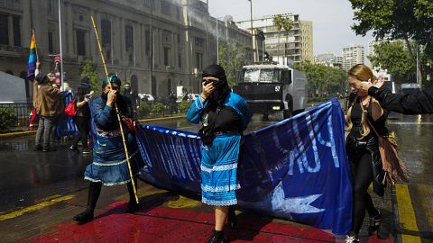 Mapuche march in Santiago on 'Day of Two Worlds' clashes with police