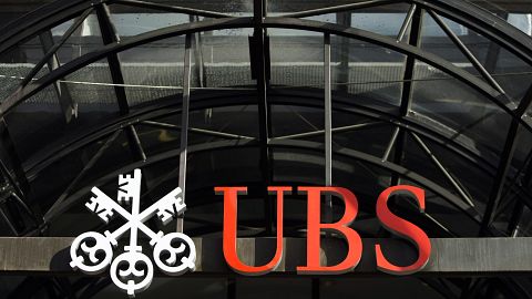 File photo. The UBS bank logo is seen above the main entrance of its offices in the City of London. 3 October 2008.