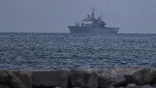 Italian Navy ship with 16 migrants on board arriving at the port of Shengjin, Albania