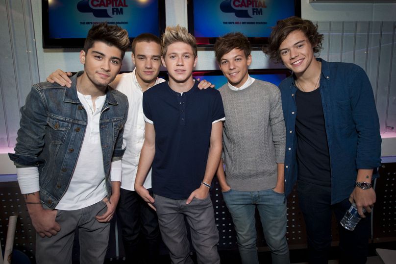 One Direction : Zayn Malik, Liam Payne, Niall Horan, Louis Tomlinson et Harry Styles (de gauche à droite) lors d'une interview sur Capital Breakfast, 5 octobre 2012.