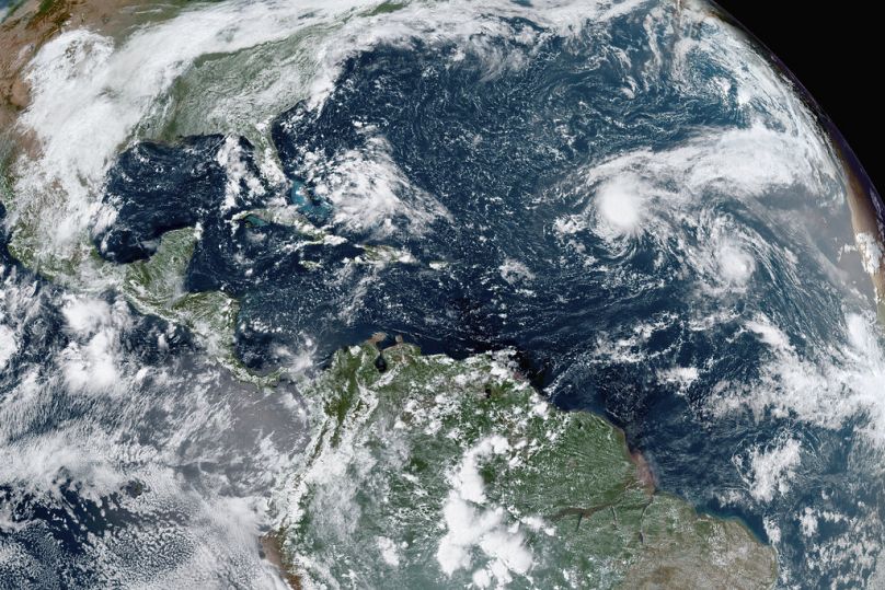 This image provided by NOAA, shows tropical storms forming in the Atlantic in 2020, for which La Nina was to blame