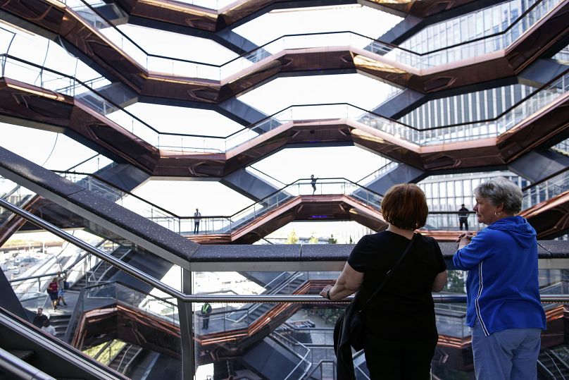 People visit the Vessel as it reopens with safety features in New York, Monday, 21 October 2024. 