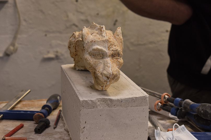 Their "grotesque" faces were once thought to ward off evil spirits. 