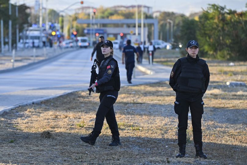 Emergency and security teams are deployed outside of Turkish Aerospace Industries Inc. at the outskirts of Ankara