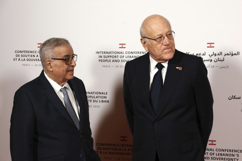 رئيس الوزراء اللبناني نجيب ميقاتي ووزير الخارجية اللبناني عبد الله بو حبيب خلال مؤتمر دولي حول لبنان في باريس