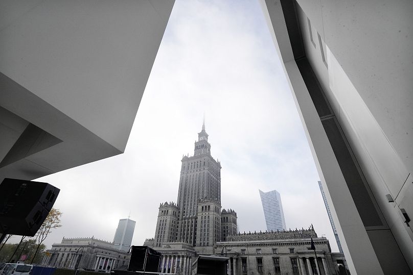 The Stalinist-era Palace of Culture and Science is seen in the background with part of the Museum of Modern Art in Warsaw, Poland