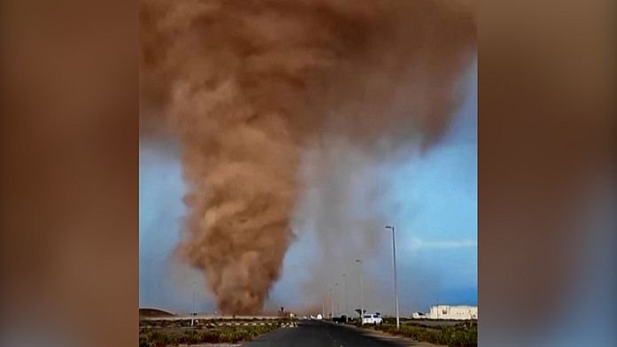 Stunning footage of huge dust tornado swirling near Sharjah in UAE