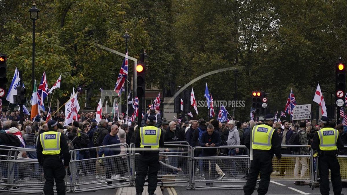 Thousands of Tommy Robinson far-right supporters march in London