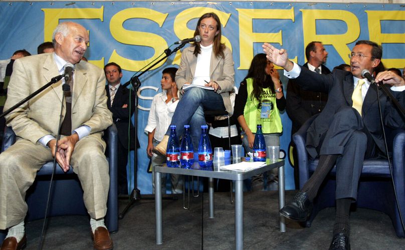 Gianfranco Fini, az Alleanza Nazionale elnöke és Fausto Bertinotti az alsóház elnöke egy vitán, középen a moderátor: Giorgia Meloni - Róma, 2006. szeptember 16.