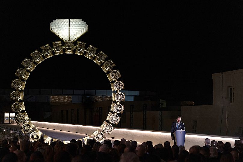 Maltese Prime Minister Robert Abela at the opening of MICAS, with Joana Vasconcelos' 'Solitaire' (2018)