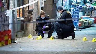 Police officers work near the scene of a shooting, in Malmo, Sweden. Police officers work near the scene of a shooting, in Malmo, Sweden.