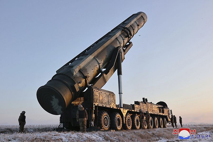 This undated photo provided Dec. 19, 2023, by the North Korean government shows what it says is an intercontinental ballistic missile (ICBM) being prepared to launch.
