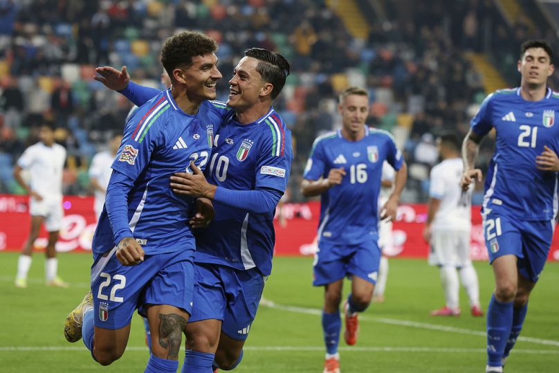 The Italian team wore blue during the match