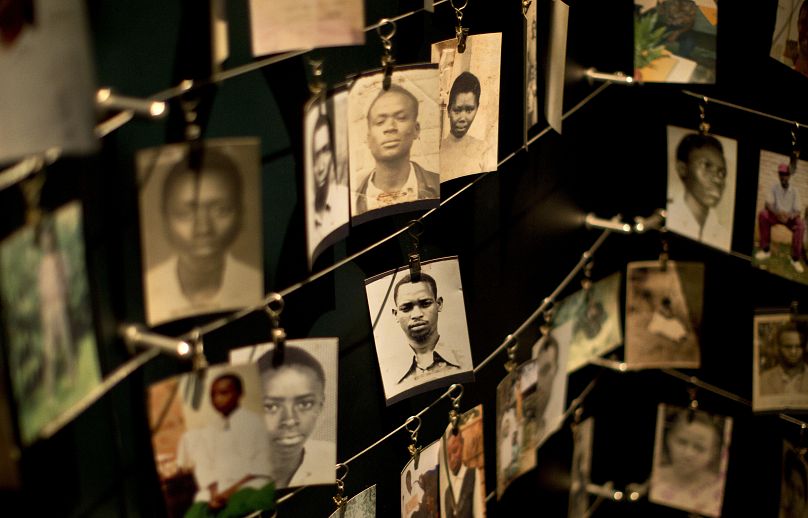 Family photographs of some of those who died hang in a display in the Kigali Genocide Memorial Centre in Kigali, Rwanda, April 5, 2014. 