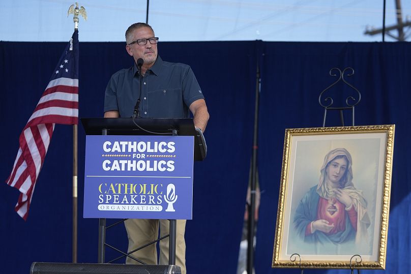 Jim Caviezel speaks during a "rosary rally" on Sunday, Aug. 6, 2023, in Norwood, Ohio