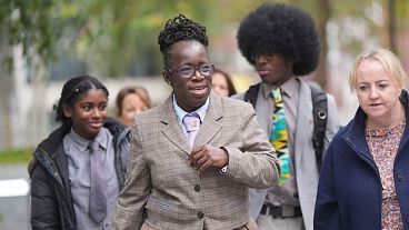 Rosamund Adoo-Kissi-Debrah, foreground centre, walks with Kerry Jack and her children after a meeting with Environment Minister Emma Hardy, London, 31 October 2024. Rosamund Adoo-Kissi-Debrah, foreground centre, walks with Kerry Jack and her children after a meeting with Environment Minister Emma Hardy, London, 31 October 2024.