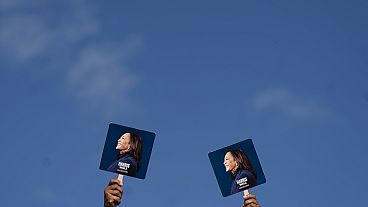 Supporters hold signs before Democratic presidential nominee Vice President Kamala Harris arrives to speak at a campaign rally, Wednesday, Oct. 30, 2024, in Raleigh, N.C. Supporters hold signs before Democratic presidential nominee Vice President Kamala Harris arrives to speak at a campaign rally, Wednesday, Oct. 30, 2024, in Raleigh, N.C.