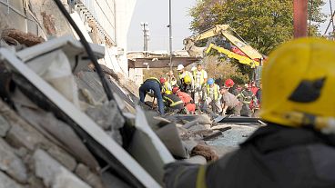 Rescue workers search for victims in the aftermath of an outdoor roof collapsed at a train station in Novi Sad, 1 November 2024 Rescue workers search for victims in the aftermath of an outdoor roof collapsed at a train station in Novi Sad, 1 November 2024