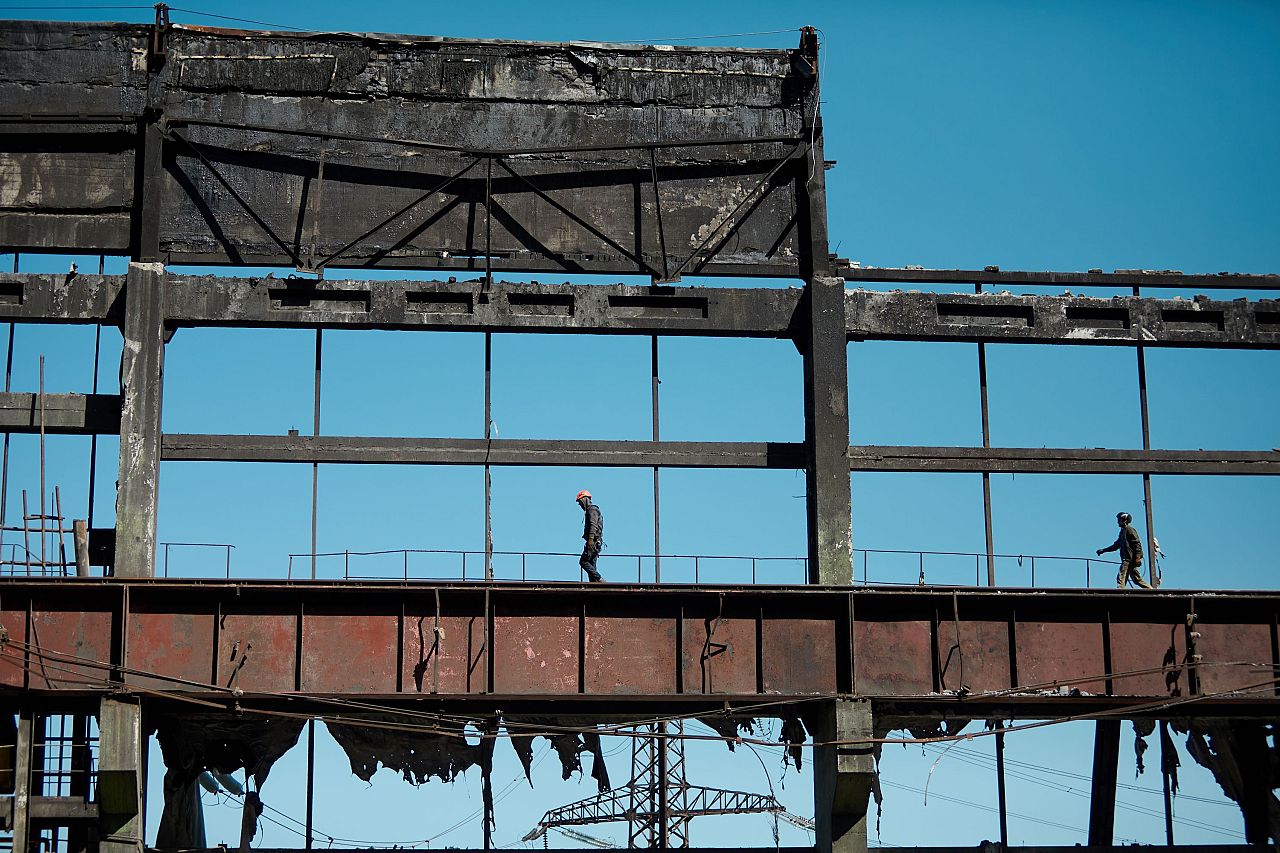 A thermal power plant is reduced to a bare skeleton in a single drone and missile strike.