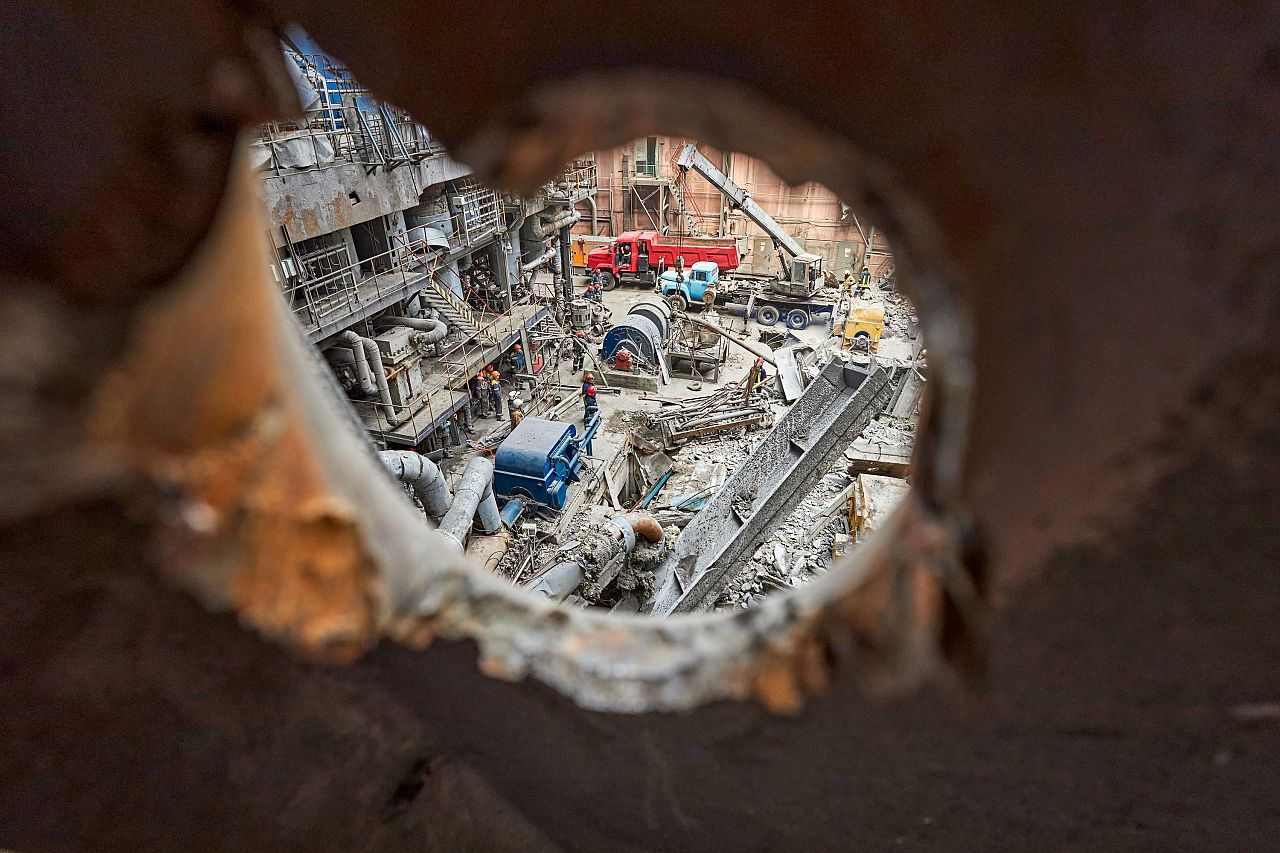 Viewed through a shrapnel hole, engineers breathe life back into a damaged power plant.