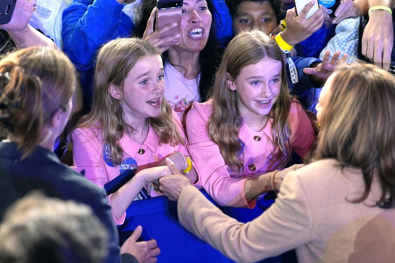 Democratic presidential nominee Vice President Kamala Harris greets young supporters at a campaign rally in Charlotte, 2 November, 2024