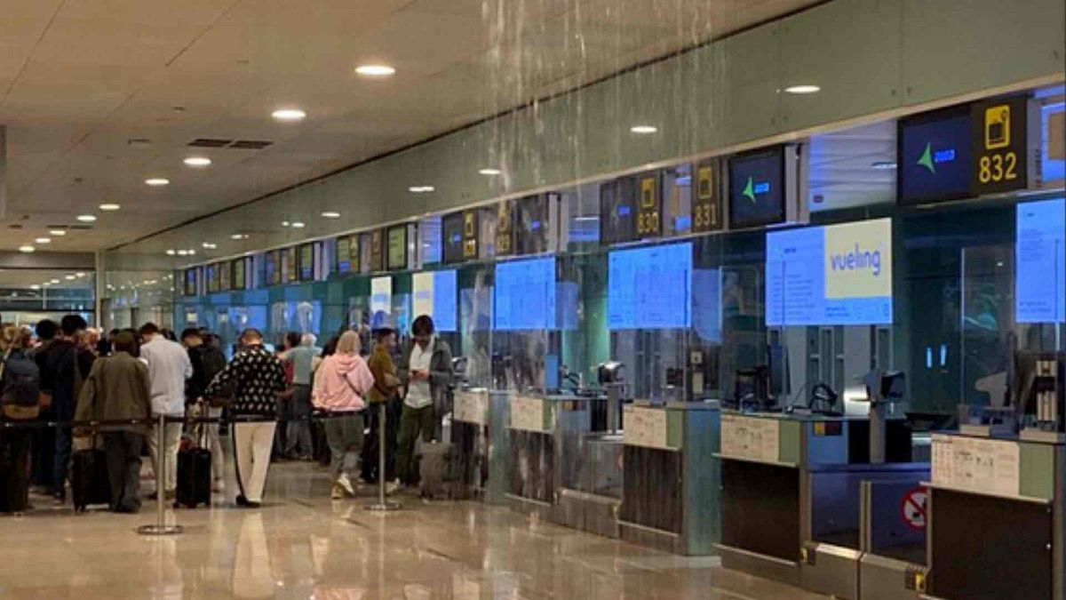 'Do not travel unless strictly necessary': Chaos at Barcelona airport as terminal and runway flooded