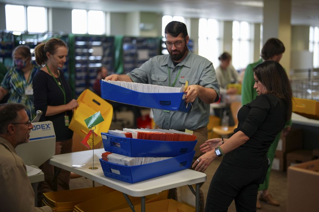 Election workers process postal votes in Pennsylvania