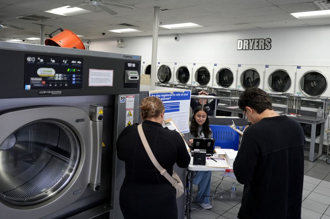Voters in a polling station inside a laundrette in Chicago