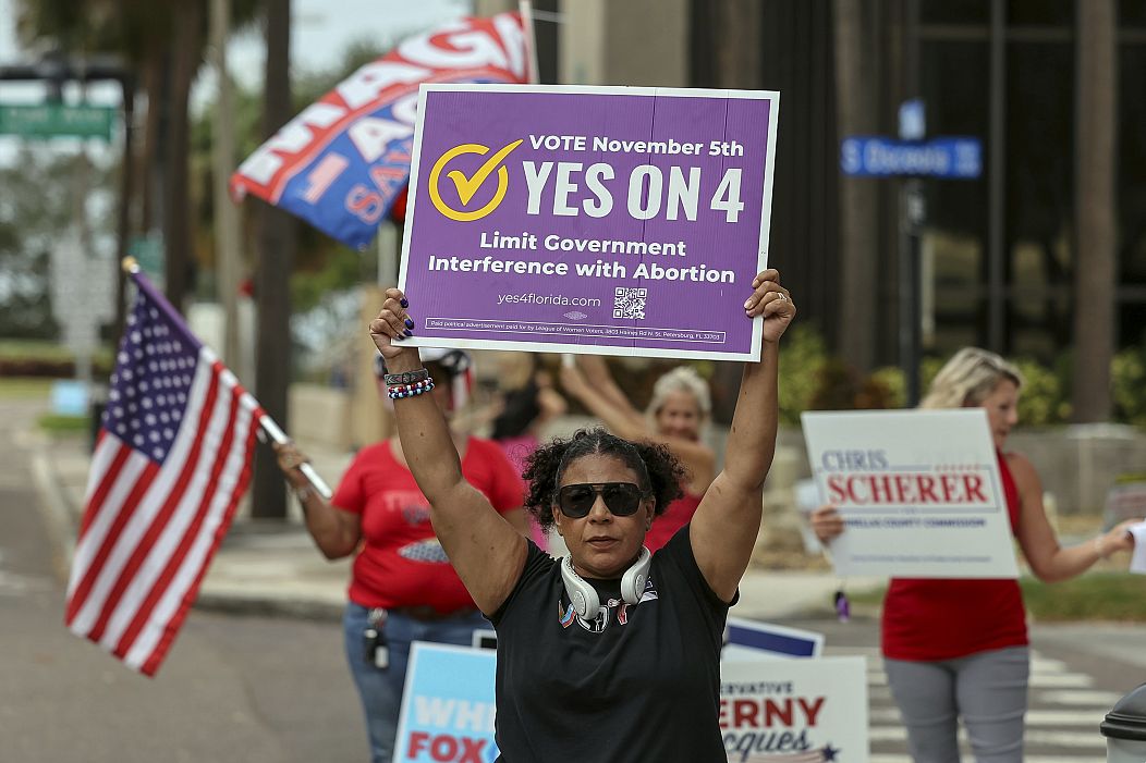 Beth Weinstein rallies in support of Yes on Amendment 4 regarding abortion in Florida outside of the polling place at the courthouse. Clearwater, Florida. 5 November 2024.