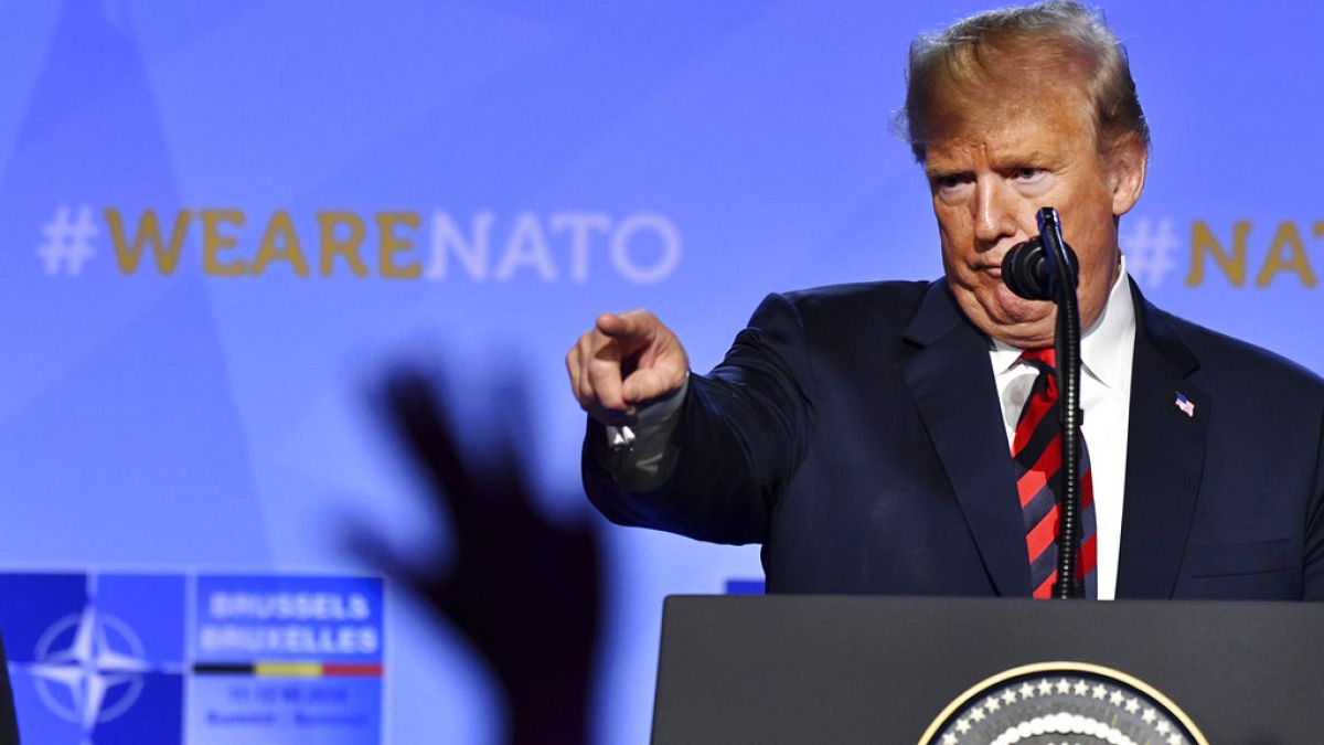 U.S. President Donald Trump points his finger during press conference after a summit of heads of state and government at NATO headquarters in Brussels, Belgium, Thursday, July