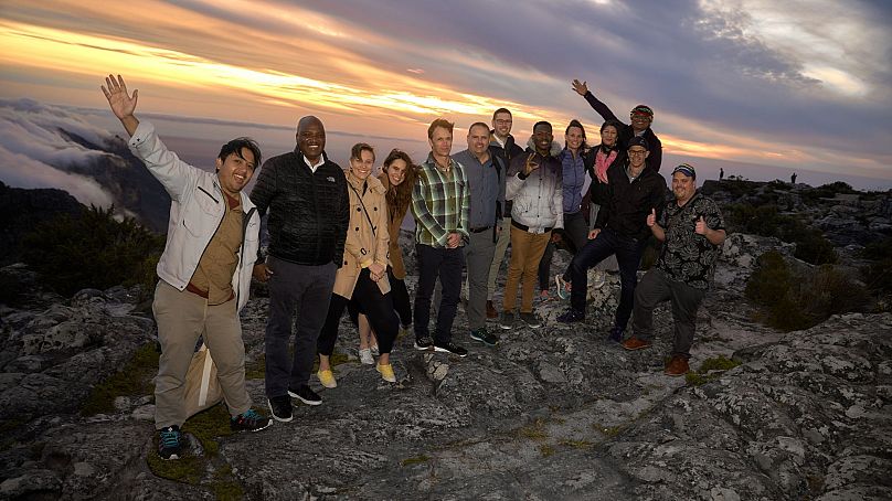 The Earthshot Prize Fellowship stand on top of Table Mountain, Cape Town