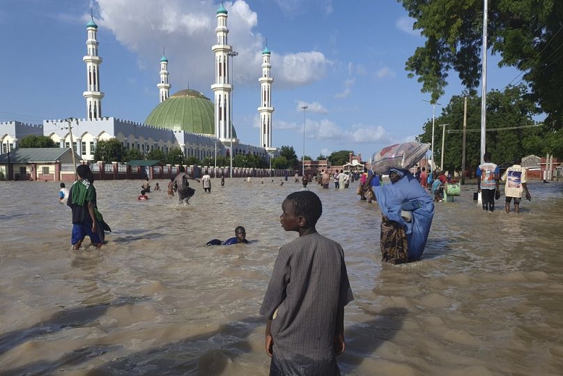 Floods in northeast Nigeria uprooted Kyariyam, 12, and her family from their home in September. 