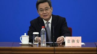 Finance Minister Lan Fo'an speaks at a press conference on a plan to boost the economy, at the Great Hall of the People in Beijing