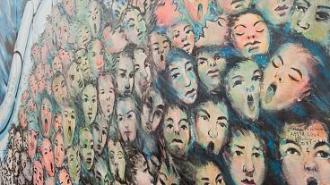 The East Side Gallery is decorated by over 100 artists from more than 20 countries. The East Side Gallery is decorated by over 100 artists from more than 20 countries.