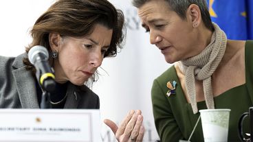 Commerce Secretary Gina Raimondo, left, speaks with European Commission Executive Vice President Margrethe Vestager. Commerce Secretary Gina Raimondo, left, speaks with European Commission Executive Vice President Margrethe Vestager.